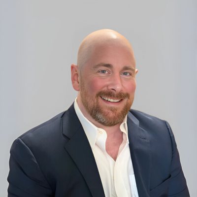 Portrait of Ian Hogan, PMHNP-BC, a board-certified psychiatric mental health nurse practitioner at Brighter Life Behavioral Services